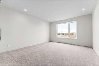 Photo 31: 56 Coulee Crescent SW in Calgary: Cougar Ridge Detached for sale : MLS®# A2116960