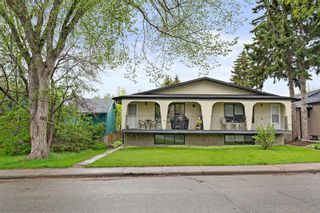 Main Photo: A & B 203 28 Avenue NW in Calgary: Tuxedo Park Semi Detached (Half Duplex) for sale : MLS®# A2136735