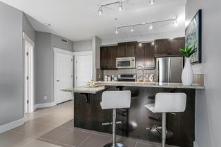 Photo 4: 103 201 20 Avenue NE in Calgary: Tuxedo Park Apartment for sale : MLS®# A1175374