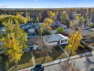 Photo 2: 2631 63 Avenue SW in Calgary: Lakeview Detached for sale : MLS®# A2084219
