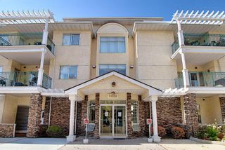 Photo 1: 107 9449 19 Street SW in Calgary: Palliser Apartment for sale : MLS®# A1039203