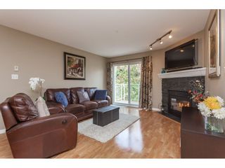 Photo 2: 405 20189 54 Avenue in Langley: Langley City Condo for sale in "Catalina Gardens" : MLS®# R2410661