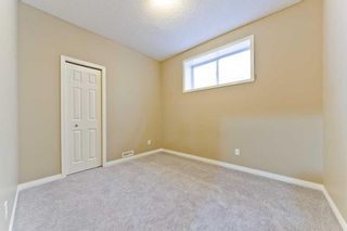 Photo 30: 59 St Moritz Terrace SW in Calgary: Springbank Hill Detached for sale : MLS®# A2080924