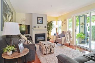 Photo 4: 4 5662 208 Street in Langley: Langley City Townhouse for sale in "The Meadows" : MLS®# R2597284