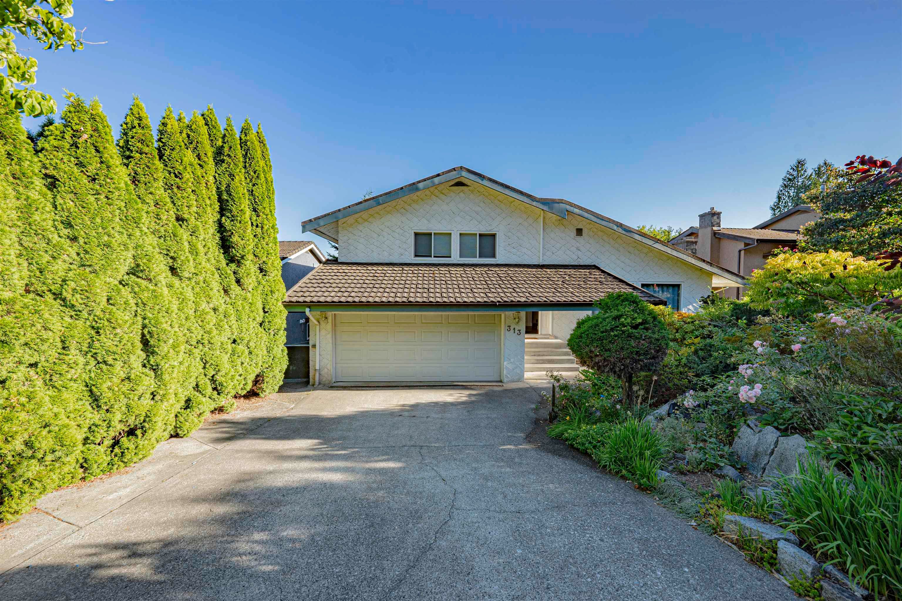 Main Photo: 313 HICKEY Drive in Coquitlam: Coquitlam East House for sale : MLS®# R2865142