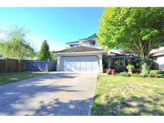 Photo 1: 20557 96B Avenue in Langley: Walnut Grove House for sale in "DERBY HILLS" : MLS®# F1422180