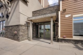 Main Photo: 325 10 Westpark Link SW in Calgary: West Springs Apartment for sale : MLS®# A2067445