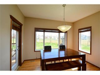 Photo 11: 112 WEST POINTE Manor: Cochrane House for sale : MLS®# C4116504