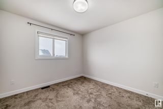 Photo 32: 5705 CAUTLEY Crescent in Edmonton: Zone 55 House Half Duplex for sale : MLS®# E4385289
