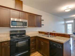 Photo 4: 301 8531 YOUNG Road in Chilliwack: Chilliwack Proper South Condo for sale in "The Auburn Residences" : MLS®# R2828765