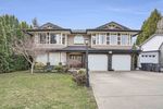 Main Photo: 7015 142 Street in Surrey: East Newton House for sale : MLS®# R2872133