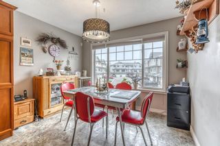 Photo 12: 42 Crystal Shores Cove: Okotoks Row/Townhouse for sale : MLS®# A1218306