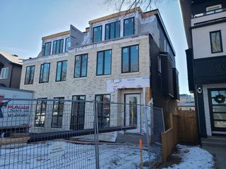 Main Photo: 627 55 Avenue SW in Calgary: Windsor Park Semi Detached (Half Duplex) for sale : MLS®# A2029948