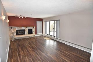 Photo 4: 106 3719C 49 Street NW in Calgary: Varsity Apartment for sale : MLS®# A2110380