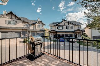 Photo 34: 145 Rockyspring Grove NW in Calgary: Rocky Ridge Row/Townhouse for sale : MLS®# A2002116