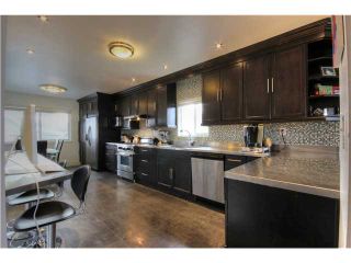 Photo 6: 3102 E 4TH Avenue in Vancouver: Renfrew VE House for sale in "RENFREW" (Vancouver East)  : MLS®# V1106704