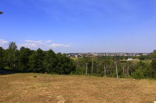 Photo 1: 90 Springborough Green SW in Calgary: Springbank Hill Residential Land for sale : MLS®# A1229697