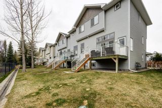 Photo 26: 10 Crystal Shores Cove: Okotoks Row/Townhouse for sale : MLS®# A1217849