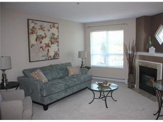 Photo 1: 109 2960 PRINCESS in Coquitlam: Canyon Springs Townhouse for sale in "THE JEFFERSON" : MLS®# V930888