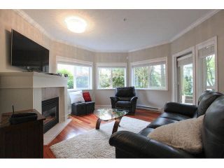 Photo 3: 105 1630 154 Street in Surrey: King George Corridor Condo for sale in "CARLTON COURT" (South Surrey White Rock)  : MLS®# F1438775