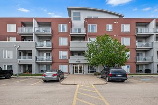 Photo 1: 1203 604 East Lake Boulevard NE: Airdrie Apartment for sale : MLS®# A2053810