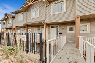 Photo 24: 14 169 Rockyledge View NW in Calgary: Rocky Ridge Row/Townhouse for sale : MLS®# A1159449