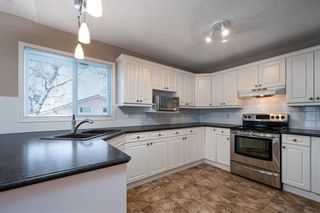 Photo 7: 30 Signature Manor SW in Calgary: Signal Hill Row/Townhouse for sale : MLS®# A1186466