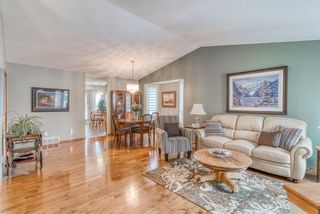 Photo 1: 210 Arbour Cliff Close NW in Calgary: Arbour Lake Semi Detached for sale : MLS®# A1086025