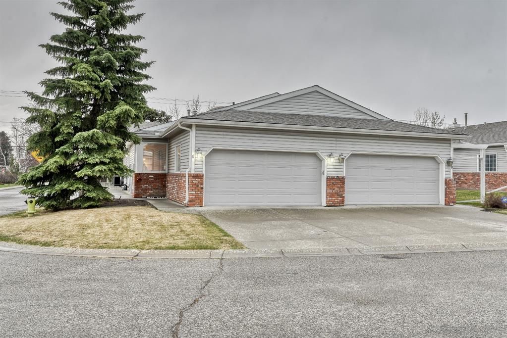 Main Photo: 4 Bow Landing NW in Calgary: Montgomery Semi Detached for sale : MLS®# A1185531