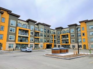 Photo 1: 319 19661 40 Street SE in Calgary: Seton Apartment for sale : MLS®# A2040294