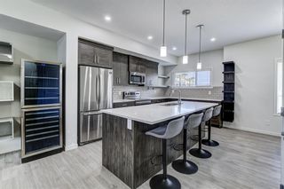 Photo 1: 284 Harvest Hills Way NE in Calgary: Harvest Hills Row/Townhouse for sale : MLS®# A2021287