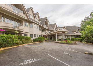 Photo 1: 307 19241 FORD Road in Pitt Meadows: Central Meadows Condo for sale in "VILLAGE GREEN" : MLS®# R2278832