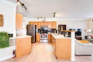 Photo 5: 505 34 Avenue NE in Calgary: Winston Heights/Mountview Semi Detached (Half Duplex) for sale : MLS®# A2107035