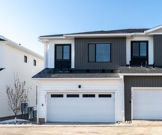 Photo 3: 12711 Crestmont Boulevard SW in Calgary: Crestmont Row/Townhouse for sale : MLS®# A2034556