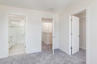 Photo 7: 321 81 Greenbriar Place NW in Calgary: Greenwood/Greenbriar Row/Townhouse for sale : MLS®# A2109243