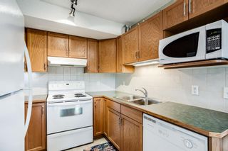 Photo 10: 401 300 Edwards Way NW: Airdrie Apartment for sale : MLS®# A1111826