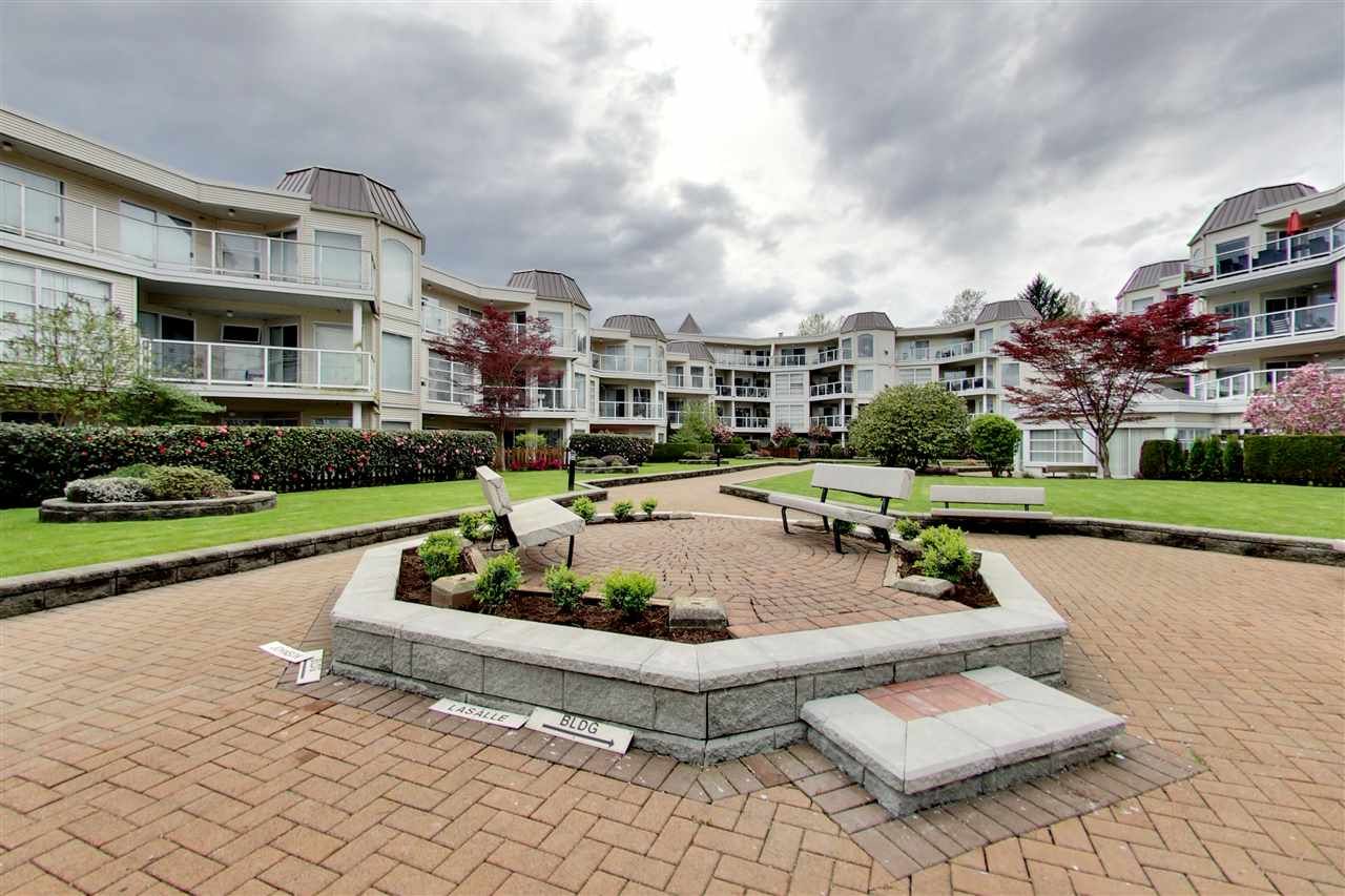 Main Photo: 216 1219 JOHNSON Street in Coquitlam: Canyon Springs Condo for sale in "MOUNTAINSIDE PLACE" : MLS®# R2159925
