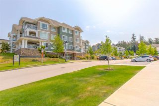 Photo 1: 317 16398 64 Avenue in Surrey: Cloverdale BC Condo for sale in "THE RIDGE AT BOSE FARMS" (Cloverdale)  : MLS®# R2476395