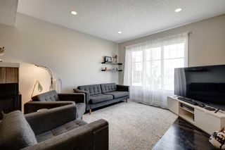 Photo 2: 1 405 33 Avenue NE in Calgary: Winston Heights/Mountview Row/Townhouse for sale : MLS®# A2116549