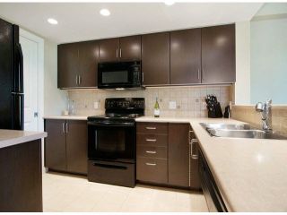 Photo 2: 206 295 GUILDFORD Way in Port Moody: North Shore Pt Moody Condo for sale in "THE BENTLEY" : MLS®# V1084423