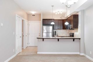 Photo 3: 206 15304 BANNISTER Road SE in Calgary: Midnapore Apartment for sale : MLS®# A2128358