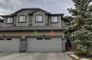 Main Photo: 61 Prominence Park SW in Calgary: Patterson Semi Detached (Half Duplex) for sale : MLS®# A2124500