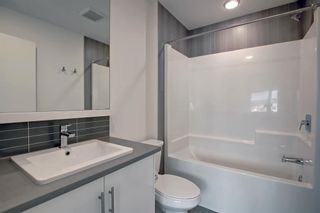 Photo 32: 73 Walden Common SE in Calgary: Walden Row/Townhouse for sale : MLS®# A1254779