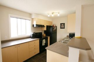 Photo 7: 8302 304 MACKENZIE Way SW: Airdrie Apartment for sale : MLS®# C4222682