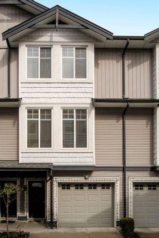 Main Photo: 59 7156 144 Street in Surrey: East Newton Townhouse for sale in "ZAAN Complex" : MLS®# R2876224