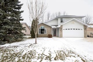 Photo 1: 107 Harvest Drive in Steinbach: R16 Residential for sale : MLS®# 202331228