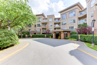 Photo 1: 302 2559 PARKVIEW Lane in Port Coquitlam: Central Pt Coquitlam Condo for sale in "THE CRESCENT" : MLS®# R2728020