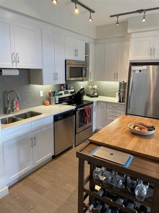 Photo 2: 406 25 Auburn Meadows Avenue SE in Calgary: Auburn Bay Apartment for sale : MLS®# A2085926
