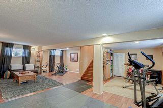 Photo 31: 99 Rockywood Circle NW in Calgary: Rocky Ridge Detached for sale : MLS®# A2054130