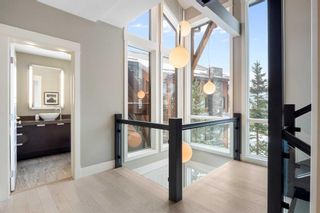 Photo 4: 201 2100E Stewart Creek Drive: Canmore Row/Townhouse for sale : MLS®# A2103818